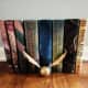 Display your golden snitch alongside your Harry Potter book collection.