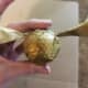 Arrange the feathers on your ball and secure with hot glue. Trim off any excess wire.