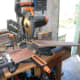 Plywood for shelf being cut to length.