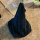 Wrap a piece of your t-shirt around to create your hat. Secure with hot glue.