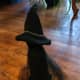 Add a chain around your hat and a ribbon around your witch's neck for pizazz.