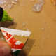 Use a thin layer of hot glue to put the pieces in place.