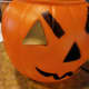 To get started, cut shapes out of your thin cardboard to fill in the indents of the face of your pumpkin.