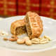 A traditional &ldquo;wu ren&rdquo; Cantonese mooncake. Wu Ren refers to five types of nuts mixed with the sweet lotus paste.
