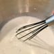 Use a whisk to whisk the mixture before transferring the bowl to the stand mixer. 