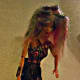 Barbie, a lovely zombie. She stands on her own, but she did lose a shoe. Probably from running after her next meal!