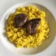 Pigeon breasts top plated rice
