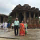 The Sabha Mandap as seen while entering the main temple area, with the pillars of the Kirti Toran seen clearly beside it. My three companions are also there in the snap. 
