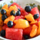 Serve the fruit salad in a bowl. Add some blueberries on top if you need some extra color.