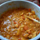 The curry is almost finished! Stir in a bowl the cornstarch and water. Add it to the curry to thicken it.