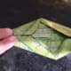 Fold the side triangles up into the Center Fold