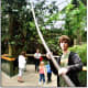 Utility cables are camouflaged as vines (my son in the foreground, never too old for the zoo)