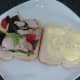 Pheasant and salad is assembled on bread