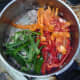 Peppers are added to sealed pheasant and softened onion