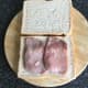 Bacon medallions laid on bread
