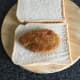 Pigeon schnitzel is laid on bread