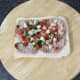 Salsa is spooned on to pheasant breast