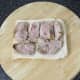 Pheasant breast is arranged on bread