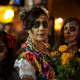 Women with calaveras makeup celebrating D&iacute;a de Muertos in the Mission District of San Francisco, California