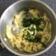 Spinach and garlic are added to mashed potatoes