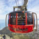 A Gondola Transports Passengers Up and Down the Mountain. The Base of the Gondola holds about 10,000 gallons of water Which Acts to Stabilize the Cars