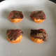 Pigeon slices top red pepper hummus