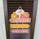 Shutter with sign