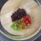 Finely diced bell pepepr strips and chopped pigeon breast