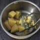 Swede turnip is mashed with a little butter