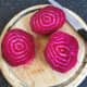 Chioggia beetroot is peeled and sliced