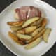 Chicken and cabbage bacon parcel with wedges