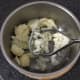Mashing potatoes