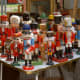 A group of older wooden nutcrackers, in the shape of soldiers. Photographed at a flea market in Berlin, Germany, 2006.