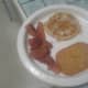 With a waffle and a side of bacon