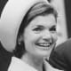 Jackie Kennedy in her trademark pillbox hat.