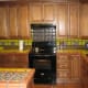 Decide how you want to use decorative tiles: borders, scattered, or in solid blocks. We used all three in this kitchen.