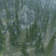 An aerial view of the path that leads up to the mountain seen to the left and the bandit towers to the right.