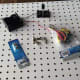 Materials required to create a simple circuit board to investigate basic current electricity.