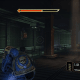 The hallway with explosive barrels lined along the walls and the two sliding servo turrets, which are already dead.