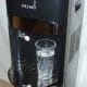 The Primo water dispenser, dispensing cold water.
