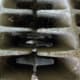 Dust, cobwebs, and debris tend to accumulate in the many spaces in a radiator.