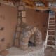 Building adobe fireplaces.