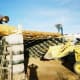 Setting vigas for roof support.
