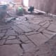 Laying flagstone floor.