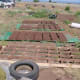 Drying adobe bricks to be used in building fireplaces.
