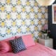 Accent one wall with wallpaper to save money and create drama.