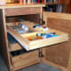 Top drawer extended; the other drawers have no dividers.
