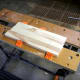 Gluing the boards together using the Workmate workbench.