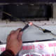 Checking the power - this wire is hot and must be shut off at the circuit breaker. The lower area with silver tape is the "up" side of the old fan.