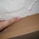 Use your finger (gloves optional) to smooth edges of room. I didn't do this on my first ceiling and I'm going back to do it this summer. This makes it look more like the ceiling was finished this way originally.
